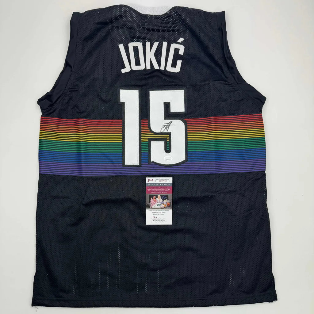 Signed Nikola Jokic Denver Black Rainbow Jersey with autographed number 15 and rainbow stripe