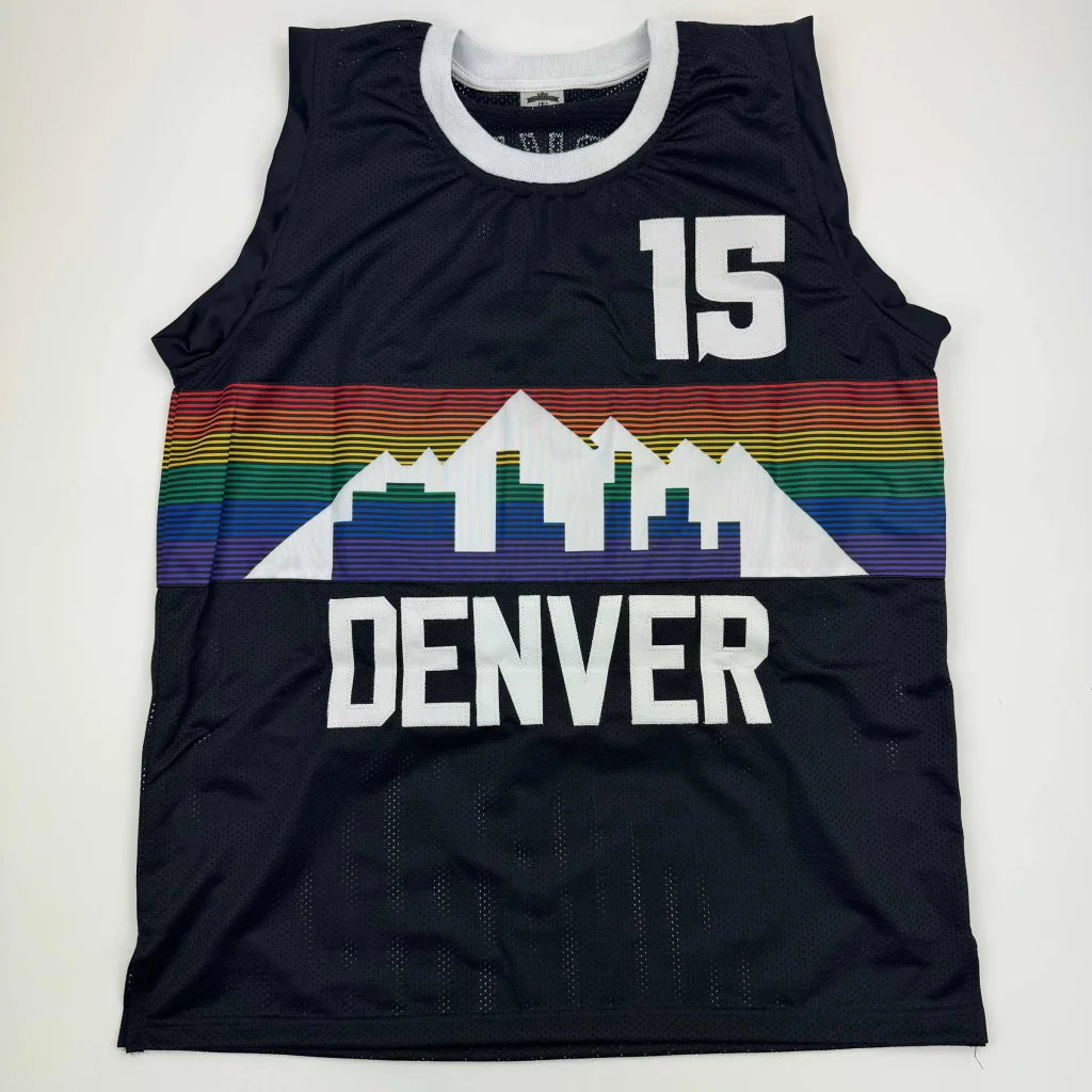 Signed Nikola Jokic Denver Black Rainbow Jersey with colorful mountain skyline graphic