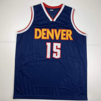 Blue Denver Nuggets custom jersey with DENVER and 15 in gold and white for professional sports fans
