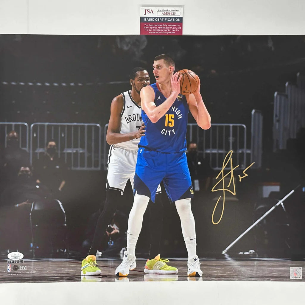 Autographed NBA photo of Nikola Jokic and teammate with third party auth, Denver Nuggets
