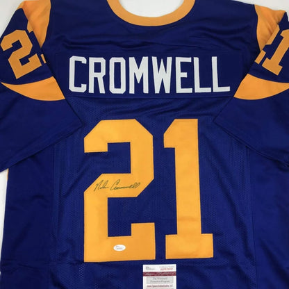 Autographed Nolan Cromwell blue custom jersey with gold accents, number 21, JSA COA