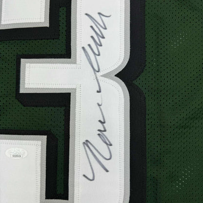 Autographed green custom jersey with white and black numbers for professional sports league