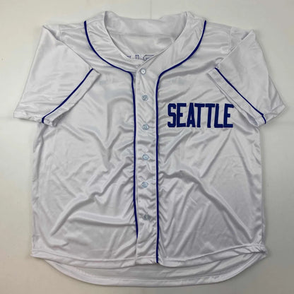 White short-sleeved baseball jersey with blue piping and SEATTLE for your custom sports gear
