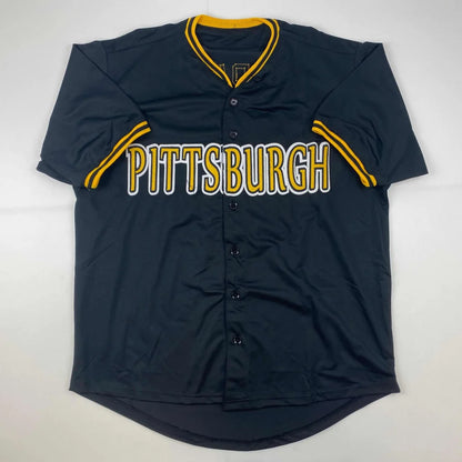 Black custom jersey from professional sports league with Pittsburgh lettering and yellow accents