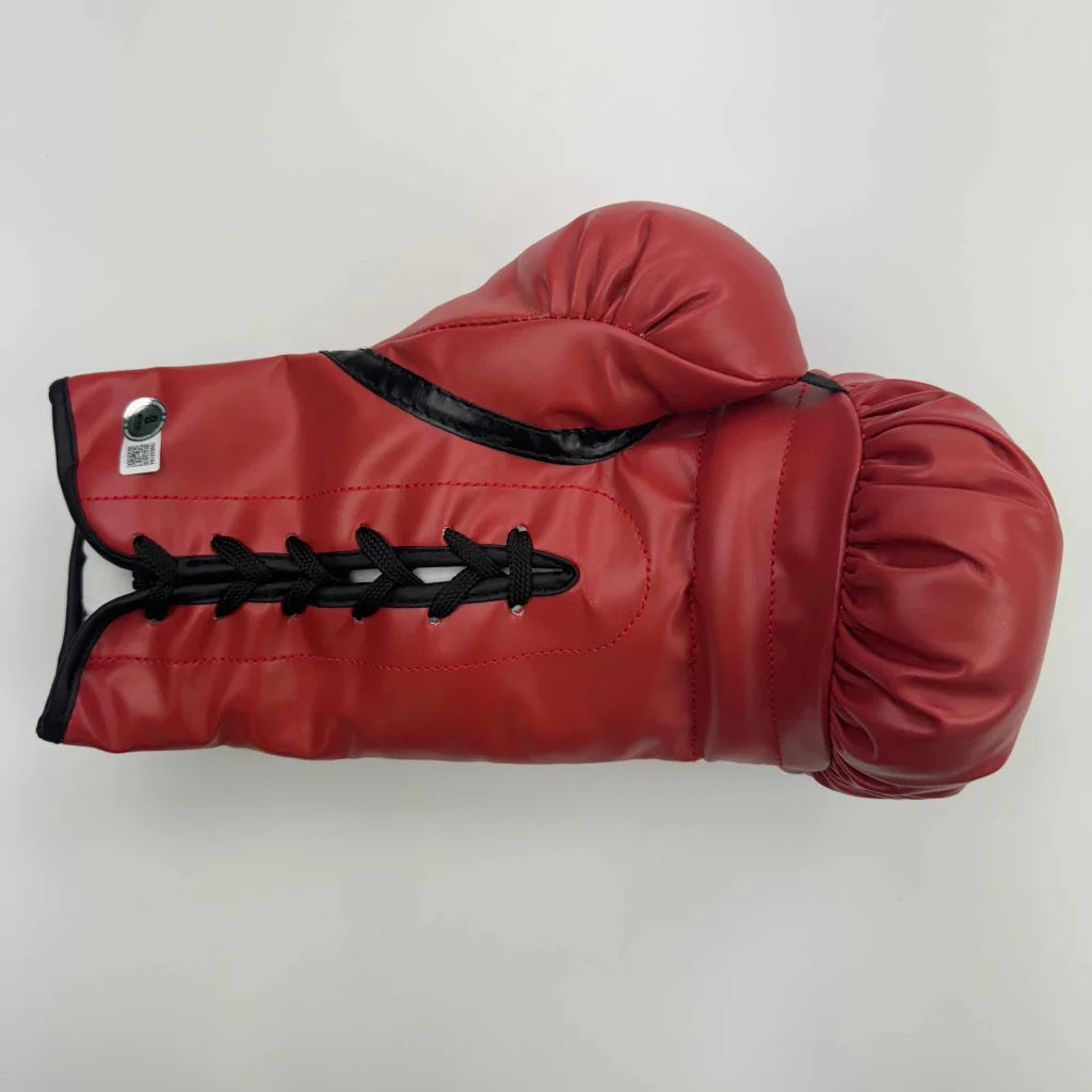Signed red Everlast boxing glove with black laces, perfect for boxing fans