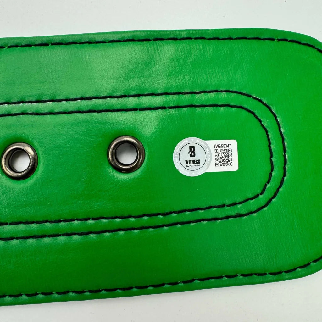 Autographed Oscar De La Hoya green leather WBC boxing belt with black stitching and silver grommets