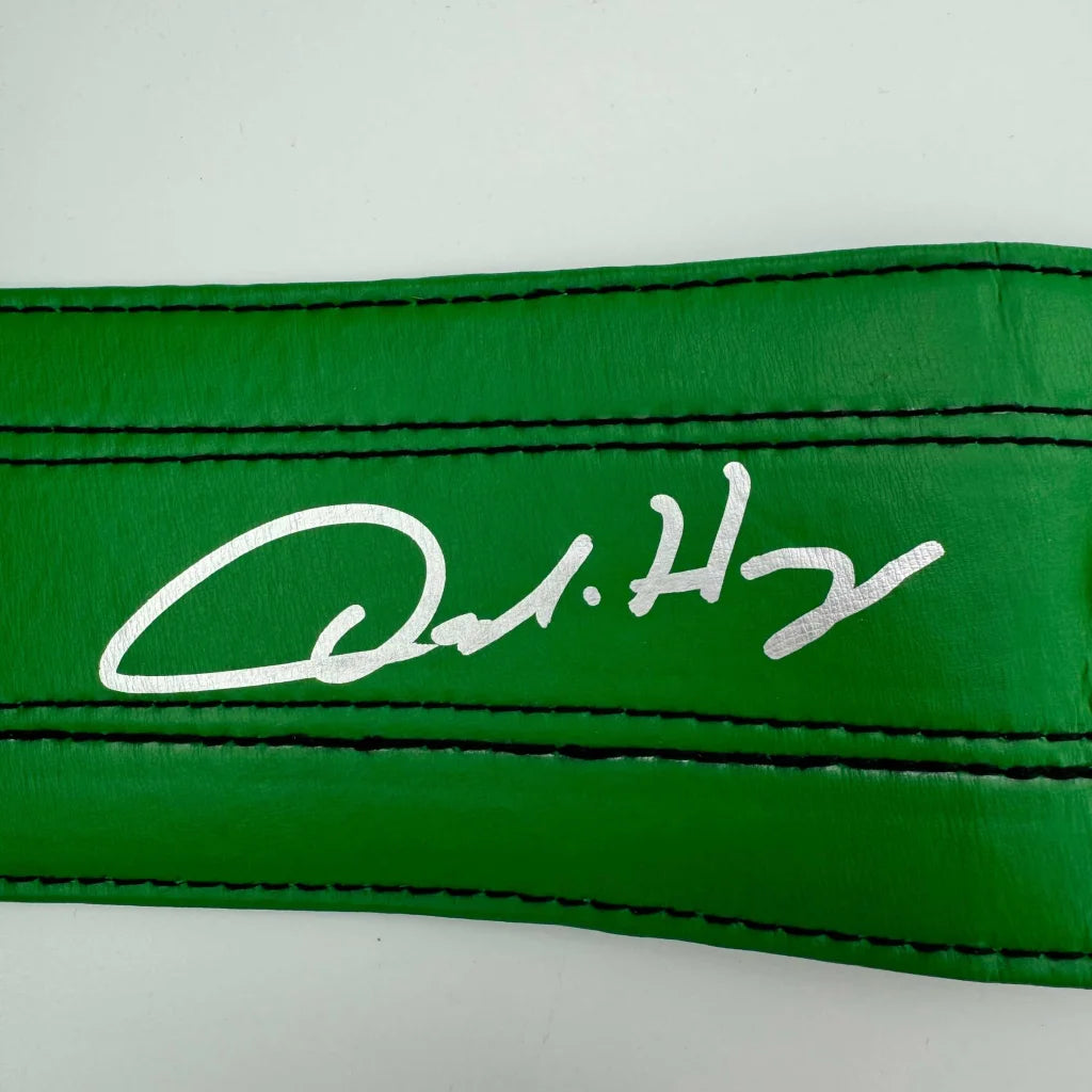 Green leather strap with silver Oscar De La Hoya signature stitch on WBC replica belt
