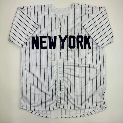White pinstriped baseball jersey with NEW YORK for PERAZA 91 signed professional sports league collectible