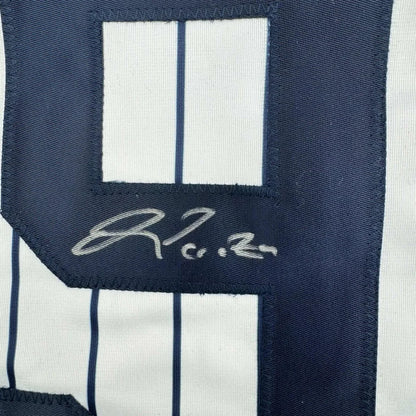 Navy blue and white pinstriped PERAZA 91 signed professional sports league jersey