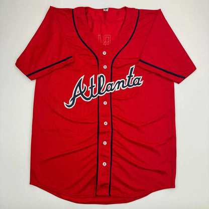 Red Atlanta jersey with Ozzie Albies signature and JSA COA authentication
