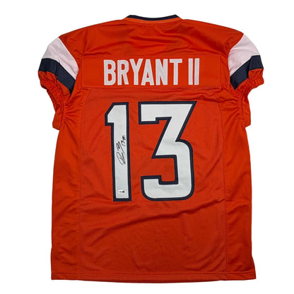 Signed orange Pat Bryant custom jersey from professional sports league