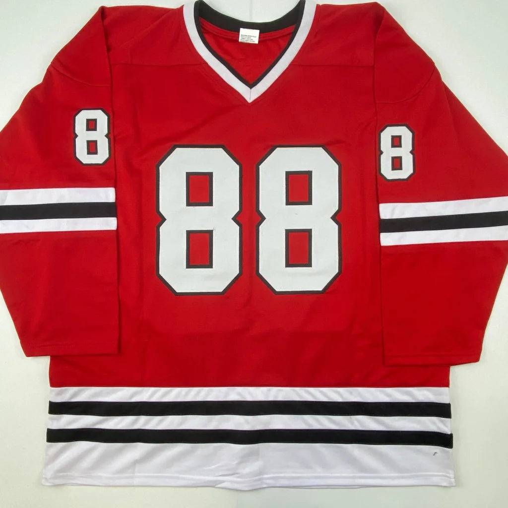 Red Patrick Kane Chicago custom jersey with white and black stripes and 88 number