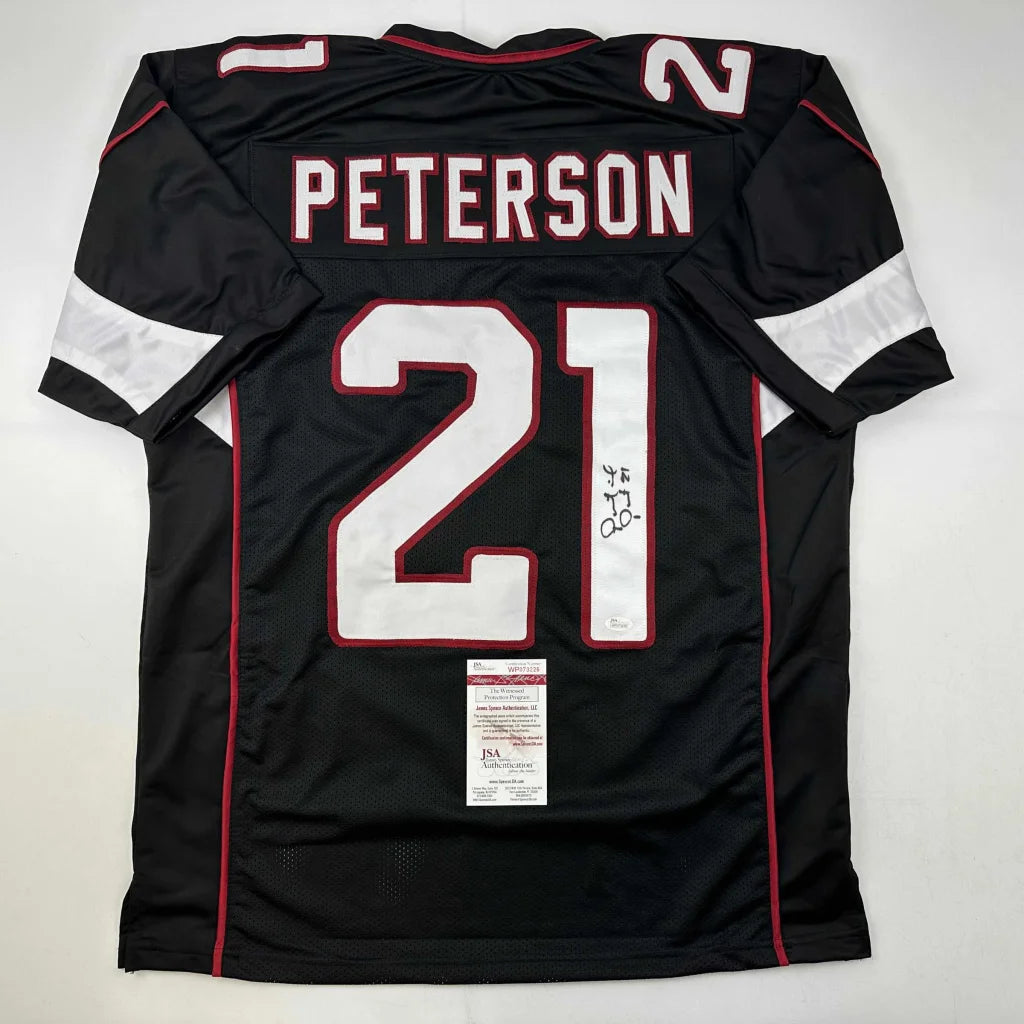 Black custom jersey with white numbers and red trim from Peterson 21 professional sports league