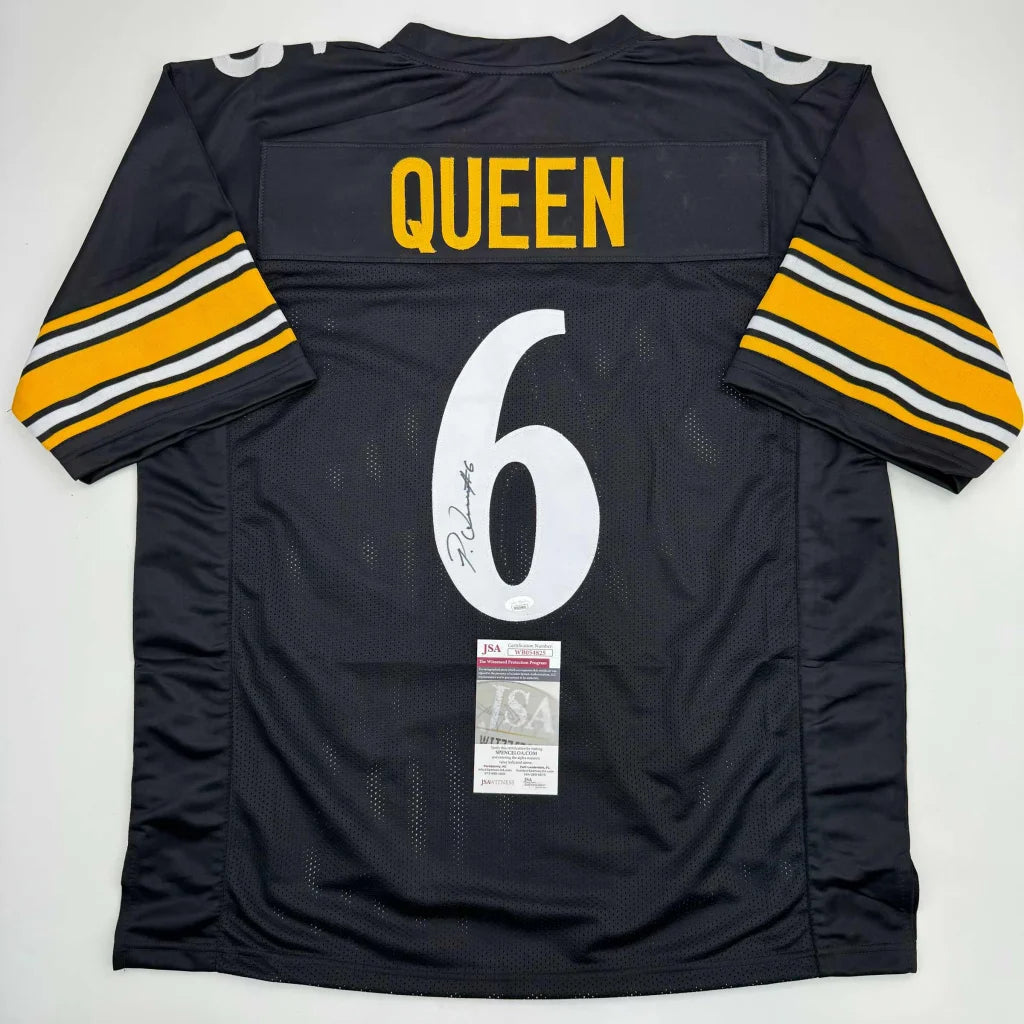 Black and gold custom jersey with number 6 and autograph from a sports league pro