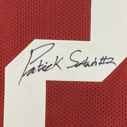 Red Patrick Surtain custom jersey with black autograph and JSA COA for collectors
