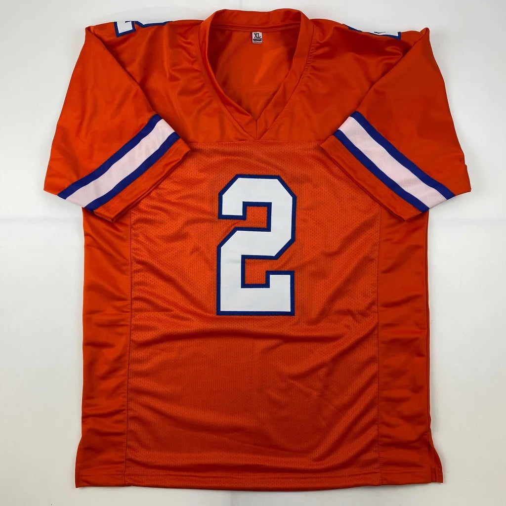 Autographed Patrick Surtain II Denver retro orange custom jersey with white and blue trim for professional sports league fans