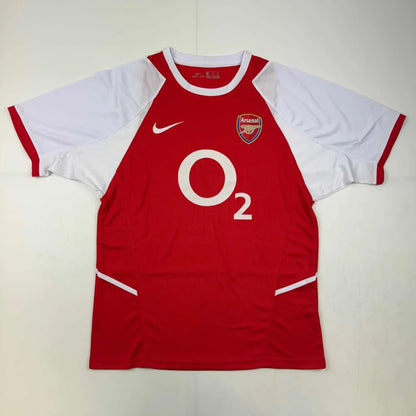 Autographed patrick vieira arsenal red custom jersey with o2 logo and nike branding from professional sports league