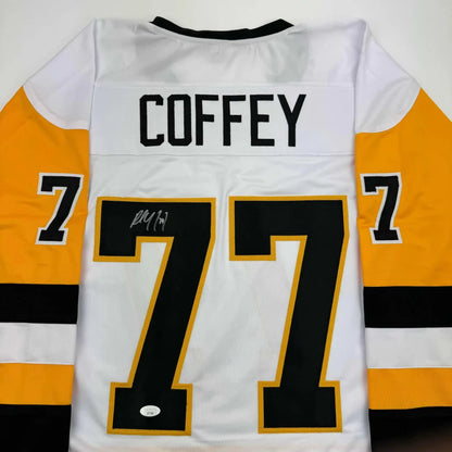 Back of a white autographed paul coffey hockey jersey with black and gold accents custom jersey for professional sports league fans