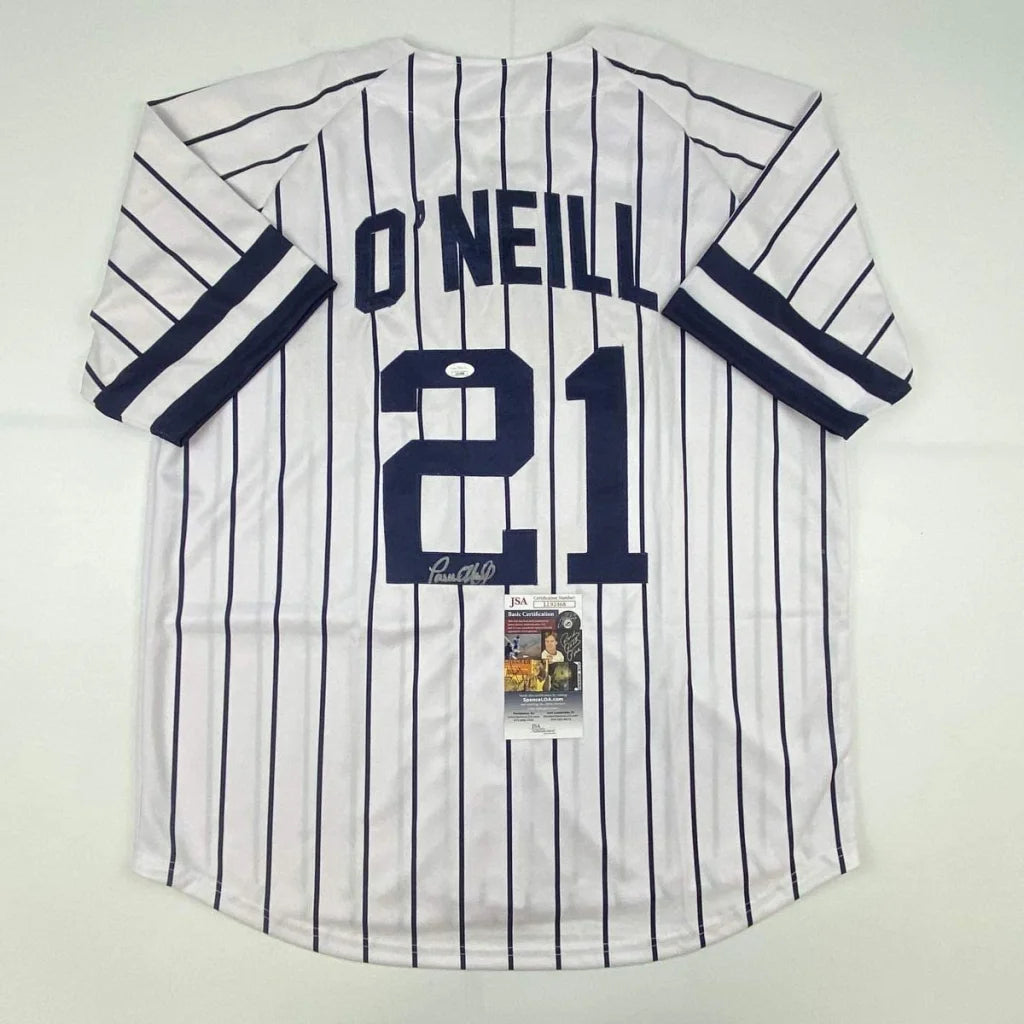 Autographed Paul O’Neill custom New York pinstripe jersey, number 21