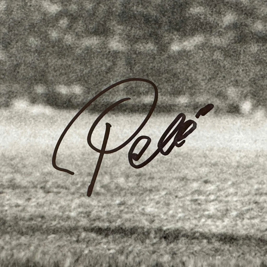 Authentic Pelé signature on a signed photo for the Pelé Bicycle Kick product