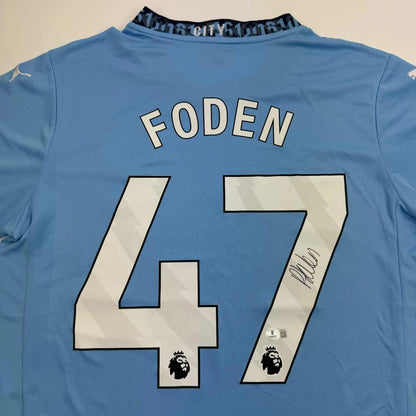 Autographed Phil Foden Manchester City Blue Soccer Futbol Jersey Beckett BAS COA #3 | Certified Authentic Signed Memorabilia | vintageantiquesgifts.com