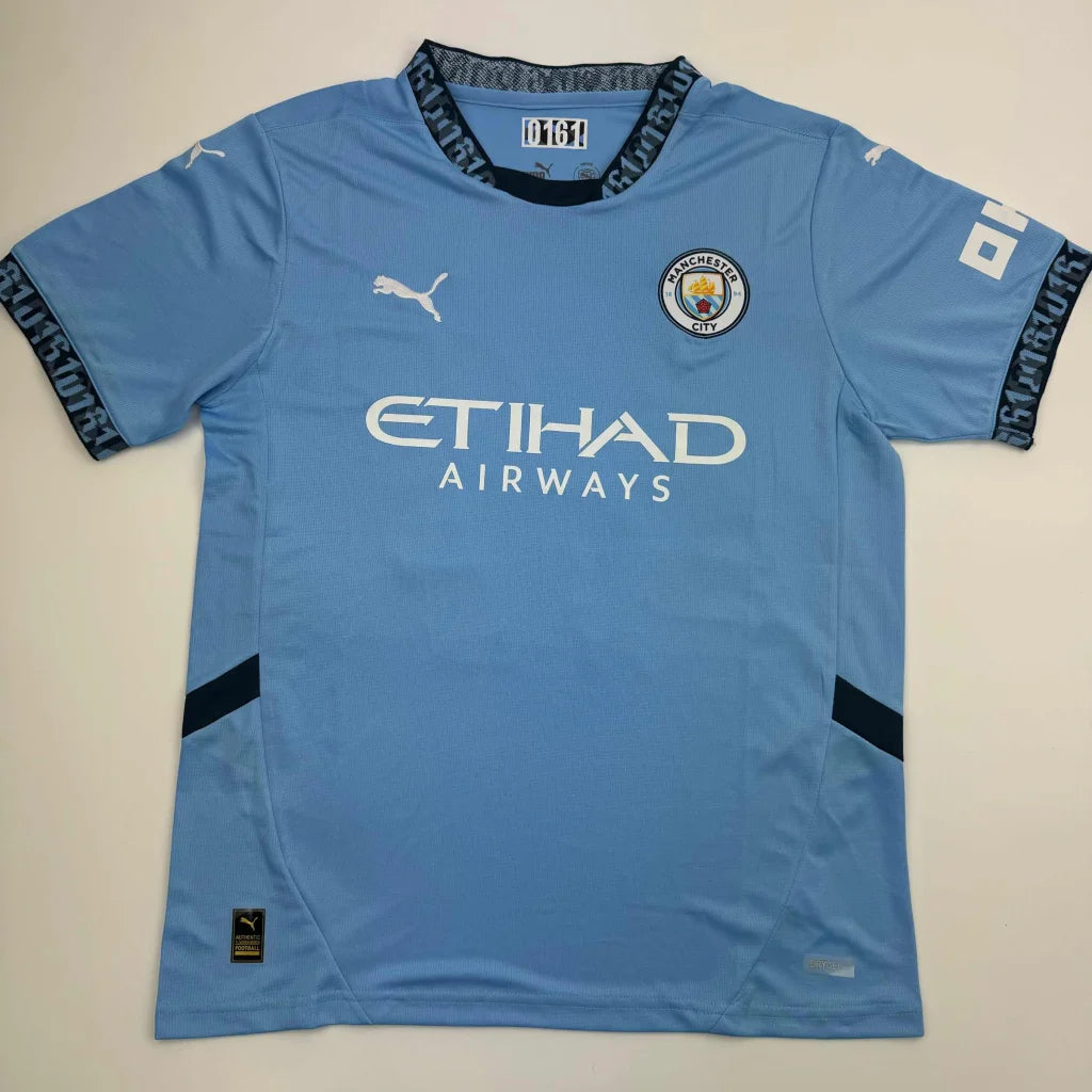 Light blue short-sleeved Manchester City blue jersey signed by Phil Foden with Beckett BAS