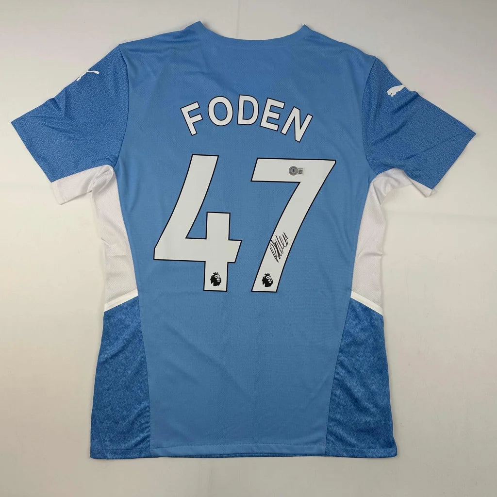 Light blue Manchester City jersey with Foden 47 and third party authentication for fans