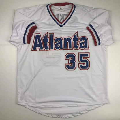 White custom jersey with red and blue trim, Atlanta 35, from professional sports league