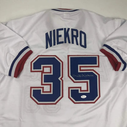 White custom jersey from professional sports legend Niekro with Niekro and 35 in blue and red