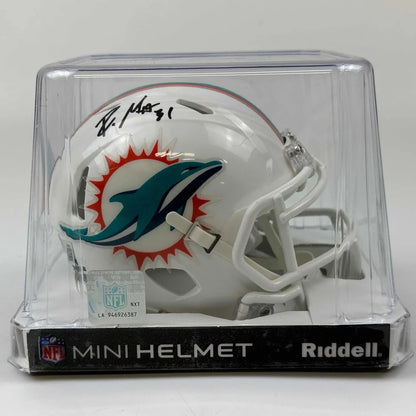 Autographed Miami Dolphins mini football helmet in display case for authentic memorabilia