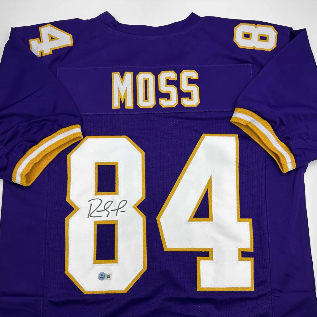 Autographed Randy Moss purple Vikings custom jersey, professional sports league icon