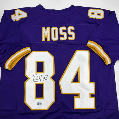 Autographed Randy Moss purple Vikings custom jersey, professional sports league icon