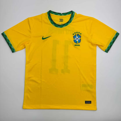 Autographed brazil yellow soccer jersey with green and white trim featuring nike swoosh for professional sports league