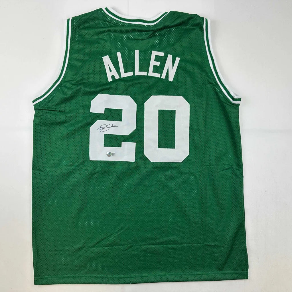 Green custom jersey from professional sports league with ALLEN 20 and signature display