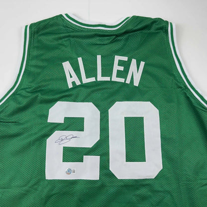 Green custom jersey from professional sports league with signature and number 20