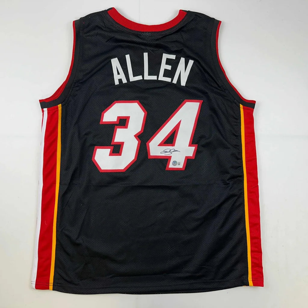 Black professional sports league jersey with ALLEN 34 and red yellow stripes