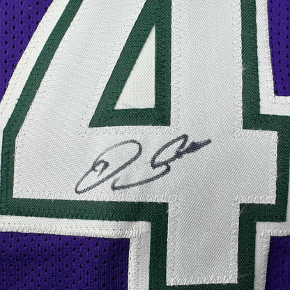 Autographed Ray Allen Milwaukee purple basketball jersey with white number four and green trim on mesh, Beckett BAS COA, custom professional sports league jersey