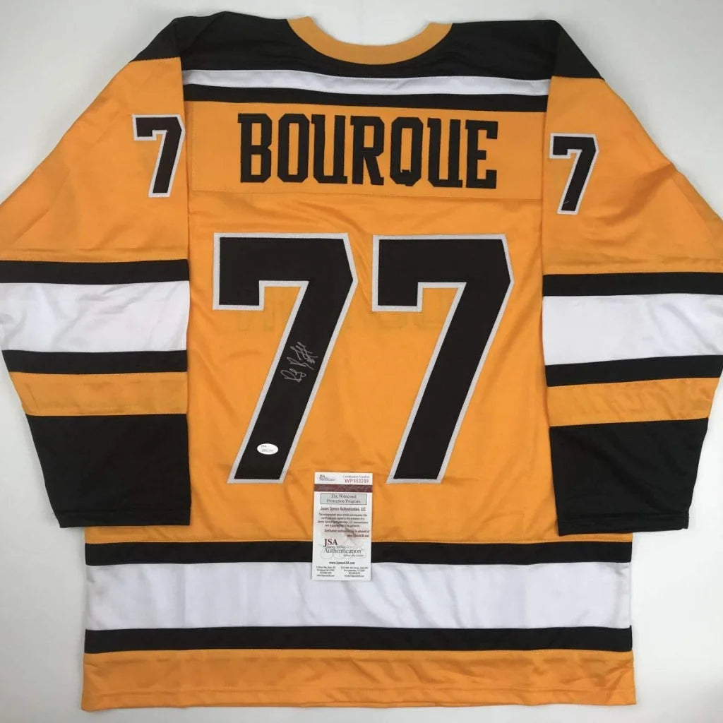 Autographed Ray Bourque #77 hockey jersey from professional sports league display