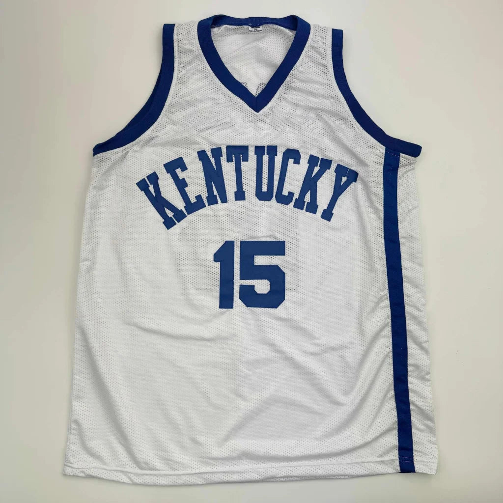 White basketball jersey with blue trim and number 15 for Completely Unique Professional Sports League