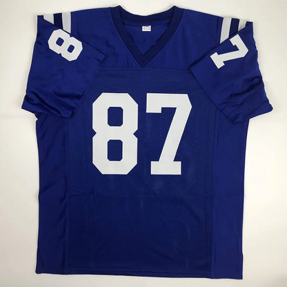 Autographed reggie wayne indiana blue football custom jersey with white 87 mesh fabric v-neck collar from professional sports league
