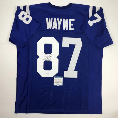 Back view of autographed blue indianapolis colts custom jersey with white number 87 and wayne name from professional sports league
