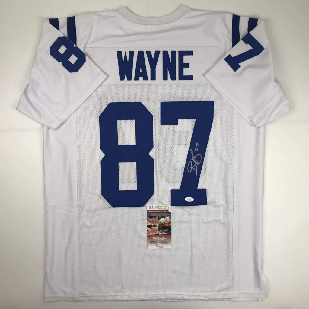 Back view of a white custom jersey with blue number 87 and wayne name featuring an autographed signature from professional sports athlete