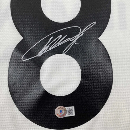 Black KAKA signed soccer jersey with white autograph and official authenticity sticker