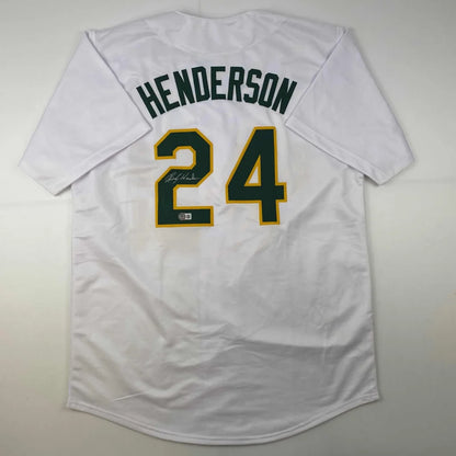 White Henderson 24 professional sports league jersey with green and gold lettering