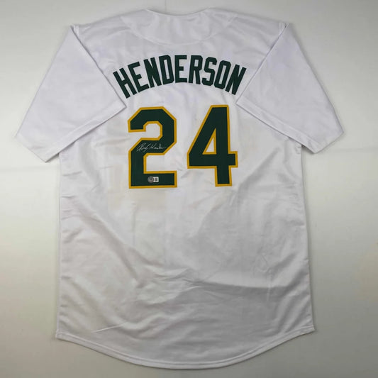 White Henderson 24 professional sports league jersey with green and gold lettering