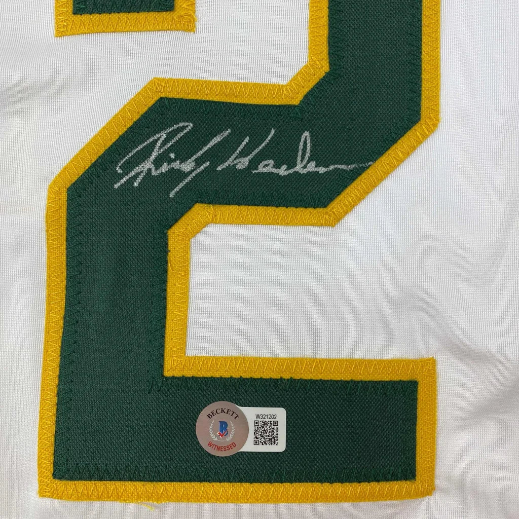 Autographed Rickey Henderson Oakland white custom jersey with green yellow 2 embroidery, Beckett BAS COA, professional sports league