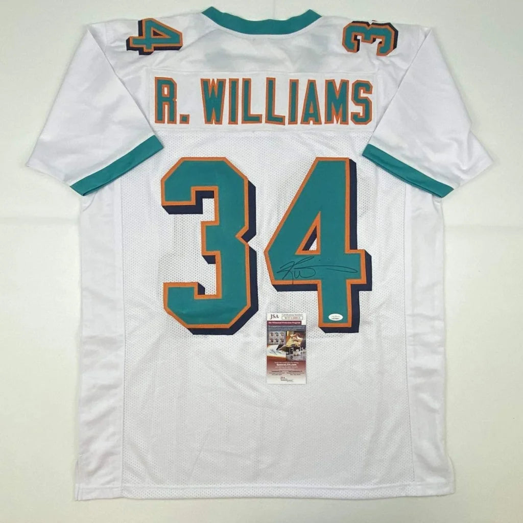 White miami dolphins custom jersey with teal and orange numerals autographed by ricky williams for professional sports league fans