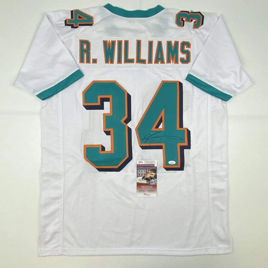 White miami dolphins custom jersey with teal and orange numerals autographed by ricky williams for professional sports league fans