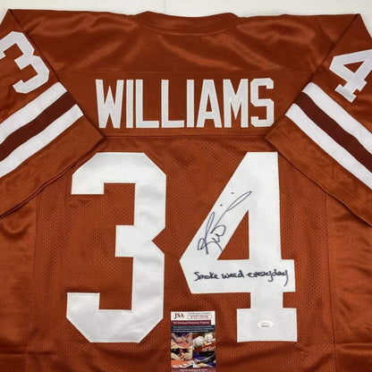 Back of a signed orange and white custom ricky williams texas college football jersey number 34 with inscription and jsacoa