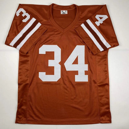 Rust-colored custom jersey featuring white numbers and stripes with v-neck design from professional sports league